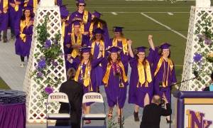 Members of North Kitsap High School’s Class of 2017 are jubilant as they arrive for graduation, June 9, at North Kitsap Stadium. (Angie Donovan/Kitsap News Group correspondent)