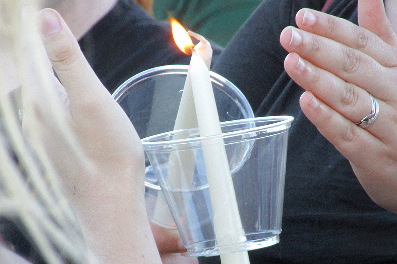 The lighting of the candles.                                Terryl Asla | Kitsap News Group