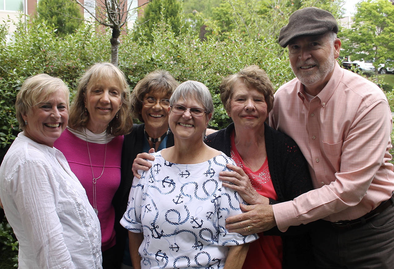 A smiling Susan Willis and the heroes who saved her life. From left, Lisa Whitcher, LPN, Kendra Bliss, RN, Sandy Mead, Susan Willis, Lori Robsinson and David Frazier.                                — Terryl Asla|Kitsap News Group