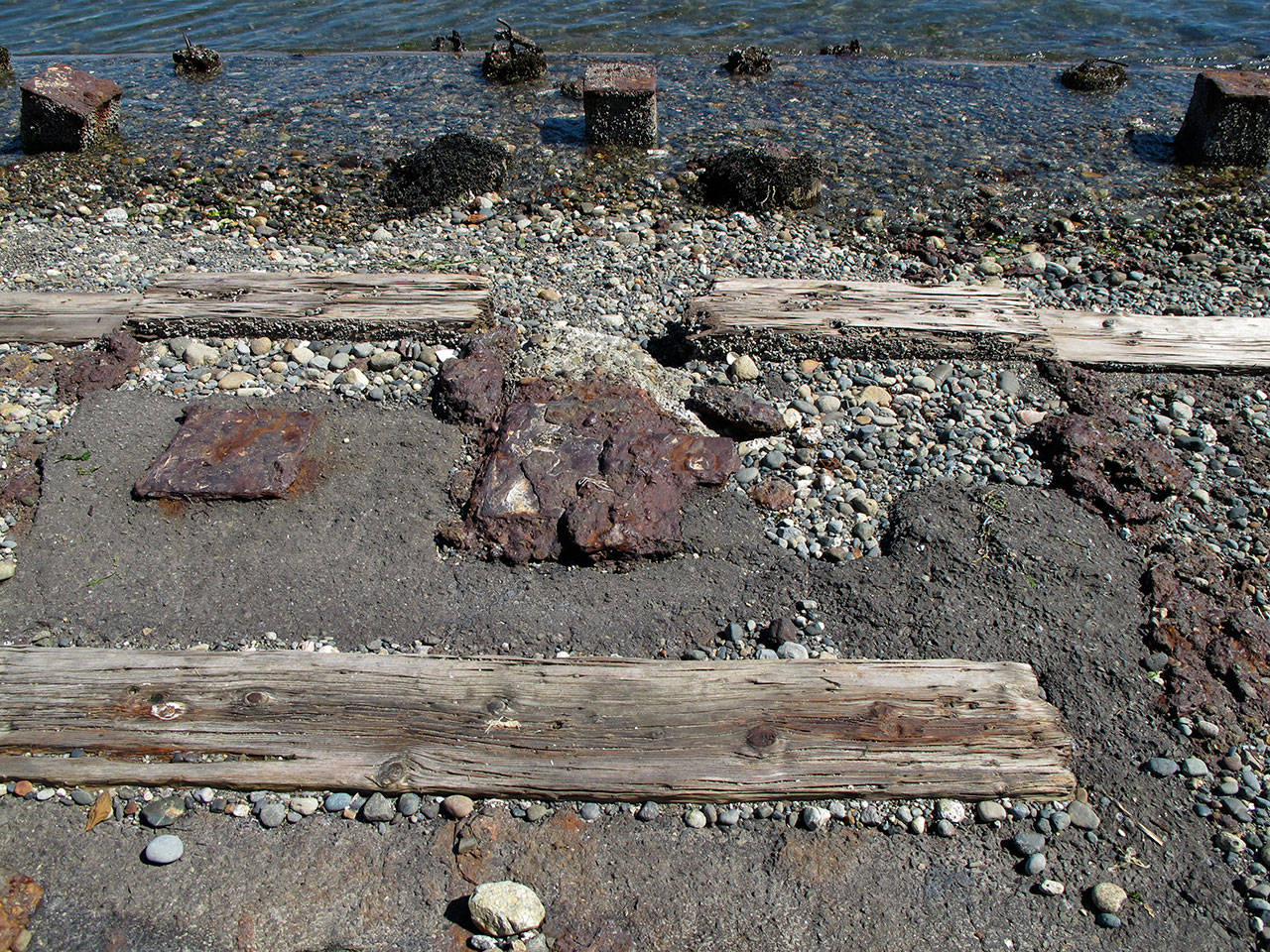 All that remains of the 600 ton ship cradle and 4,000 ton railway at the Winslow shipyard today. — Bainbridge Island Historical Society