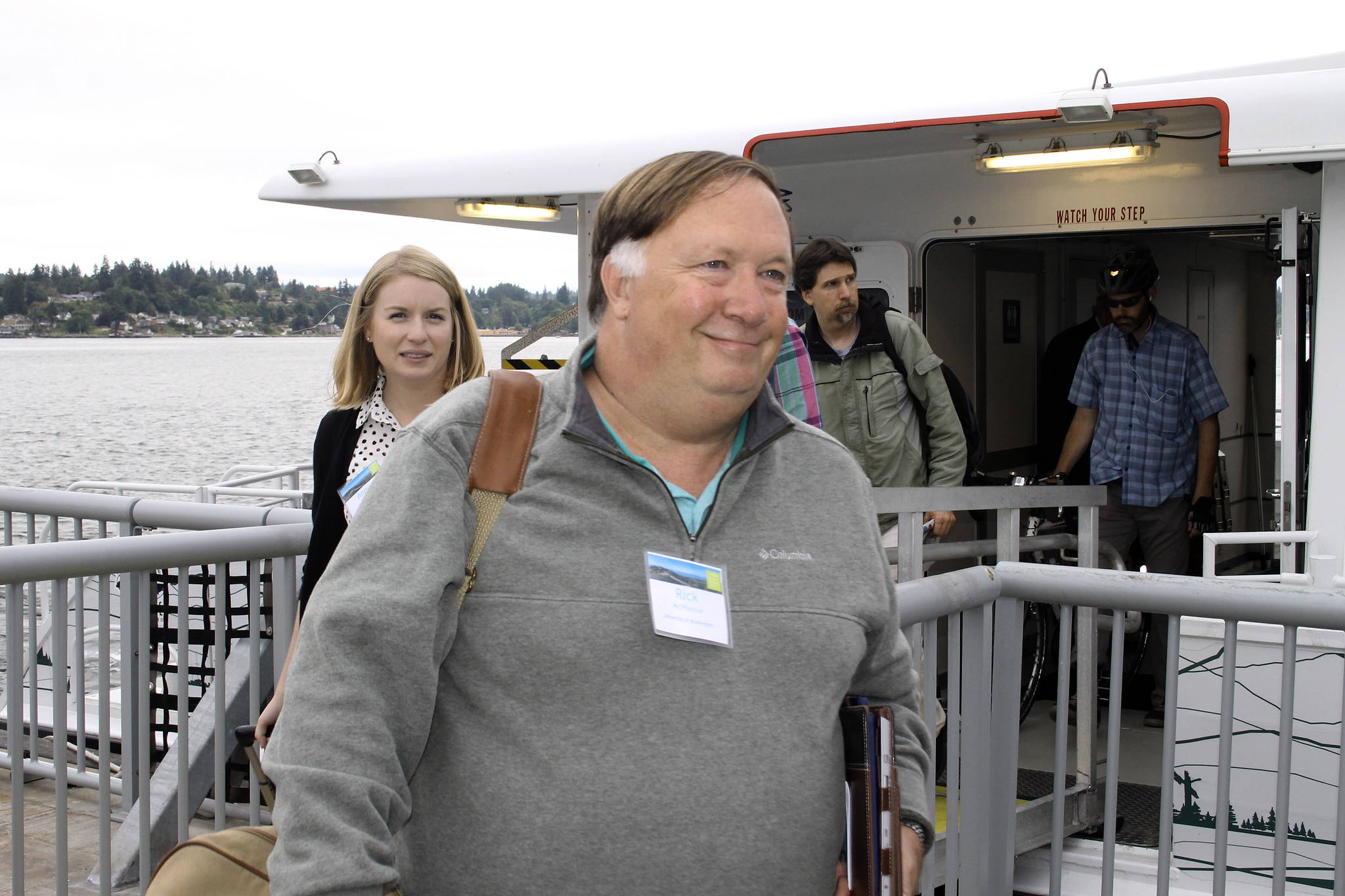 Rick McPherson, a lecturer of management at University of Washington, exits the fast ferry in Bremerton as part of a two-day study mission co-sponsored by the Seattle Metropolitan Chamber of Commerce. (Mark Krulish/Kitsap News Group)