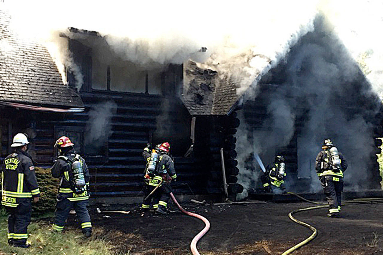 Central Kitsap Fire and Rescue, as well as Bremerton and Navy Region Northwest fire departments, battled a structure fire July 19 in the 9600 block of Misery Point Road NW.                                Photo courtesy CKFR