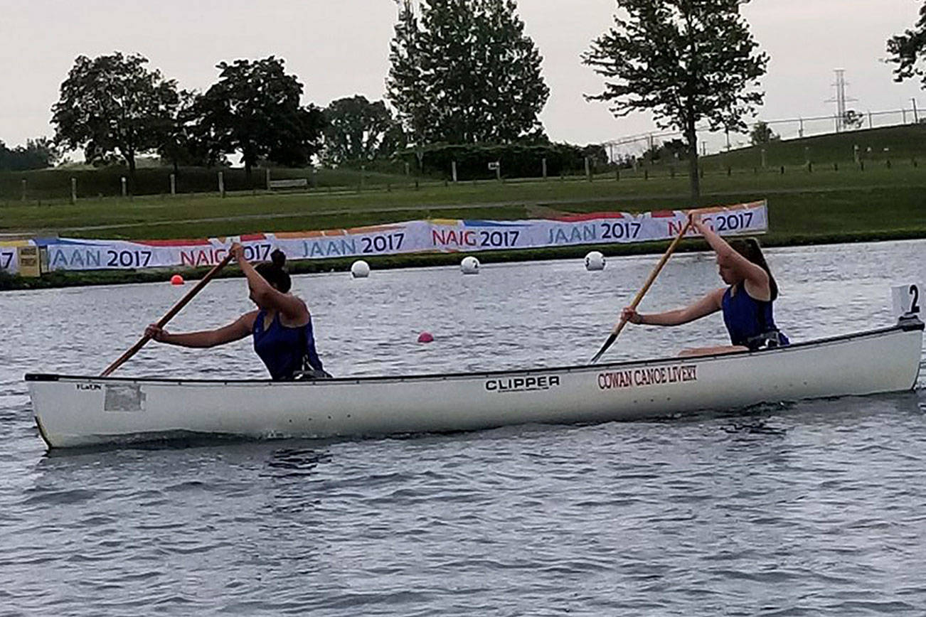 Ah-nika-leesh Chiquiti and Jenavieve Old Coyote-Bagley race their canoe at the 2017 North American Indigenous Games.