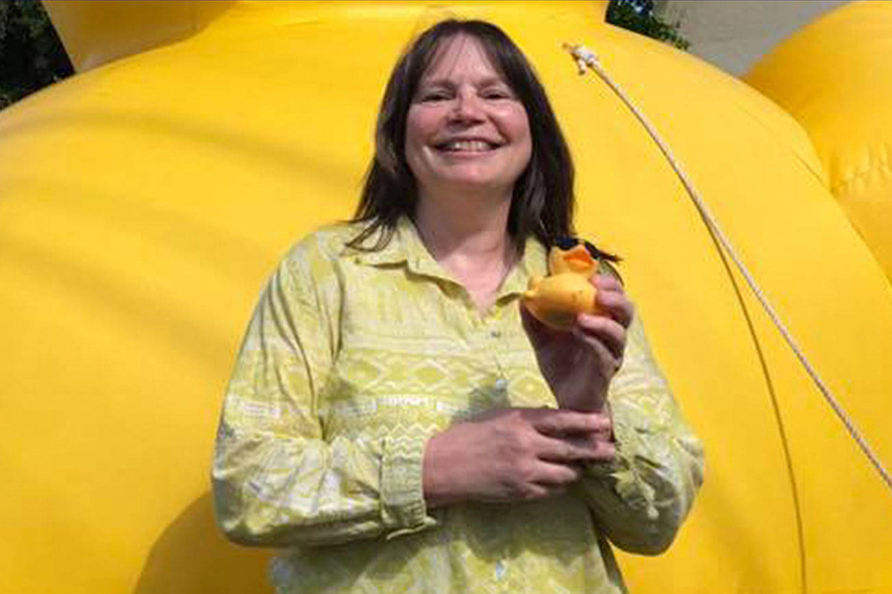 Terri Callantine of Tracyton is the 2017 Silverdale Rotary Duck Race Grand Prize winner and proud owner of an Advantage Nissan Frontier Pickup Truck (or $16,000 cash). Silverdale Rotary Club/Courtesy                                 Terri Callantine of Tracyton is the 2017 Silverdale Rotary Duck Race Grand Prize winner and proud owner of an Advantage Nissan Frontier Pickup Truck (or $16,000 cash). Silverdale Rotary Club/Courtesy