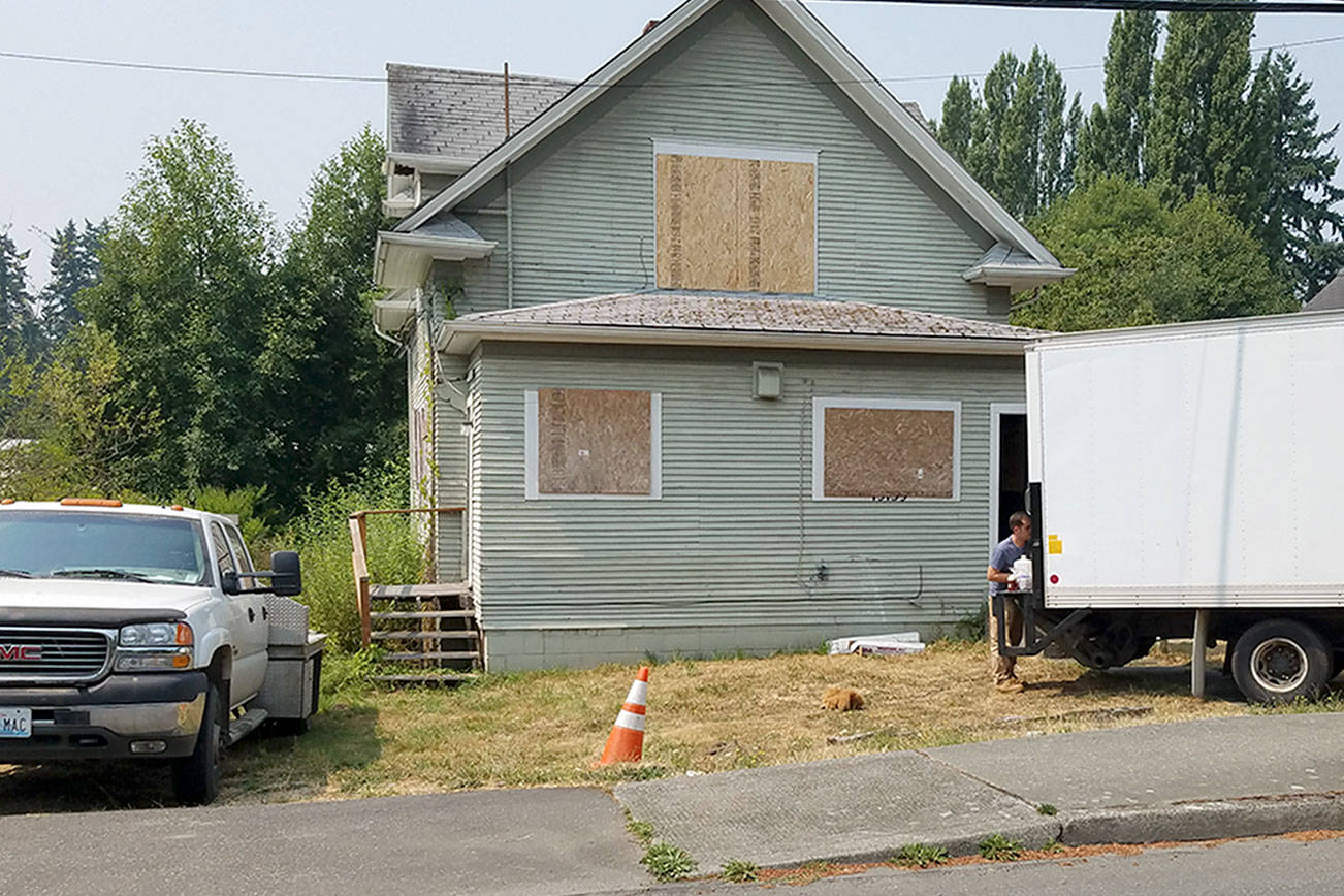 After years of effort, flood-prone house coming down