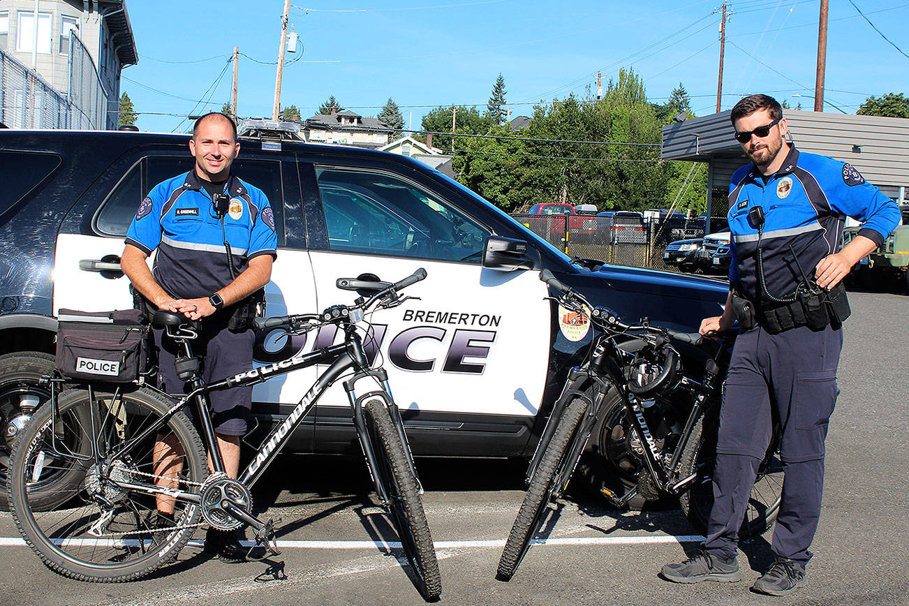 Brandon Greenhill, left, and Derek Ejda are the two full-time bicycle patrol officers for the Bremerton Police Department.                                Michelle Beahm / Kitsap News Group