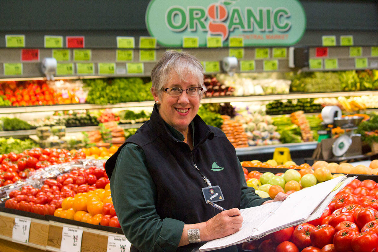 Julie Wuesthoff has served as Poulsbo Central Market’s produce manager for 11 years. “There’s a spiritual connection to the work we do,” she said. (Sophie Bonomi / Kitsap News Group)