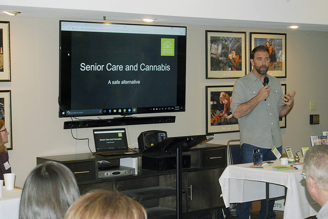 Aaron Varney leads a seminar on cannabis for seniors.