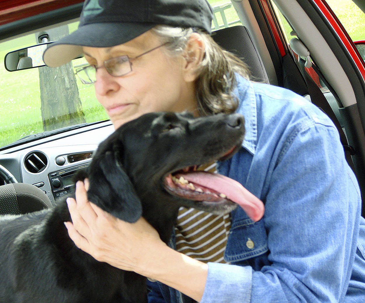 Nellie Thomas spends time with her dog Zoie. Contributed photo.