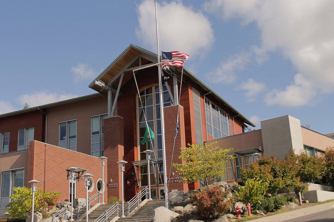 The U.S. flag was lowered Oct. 2 to half-staff outside Poulsbo City Hall. (Nick Twietmeyer/Kitsap News Group)
