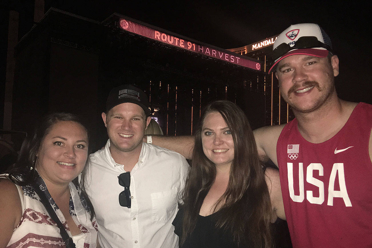 Photo courtesy of Ali Pendergrass.                                Ali Pendergrass, Nick Pendergrass, Alicia Hounsley and Tyler Hickman pose for a photo outside the Route 91 Harvest music festival, moments before a gunman opened fire on the crowd of concertgoers killing 59 and injuring 527.