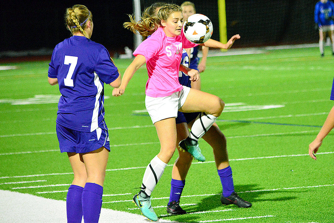 South Kitsap’s Eliza Villarma corrals a loose ball from the air during her team’s match with Sumner on Oct. 5. (Mark Krulish/Kitsap News Group)