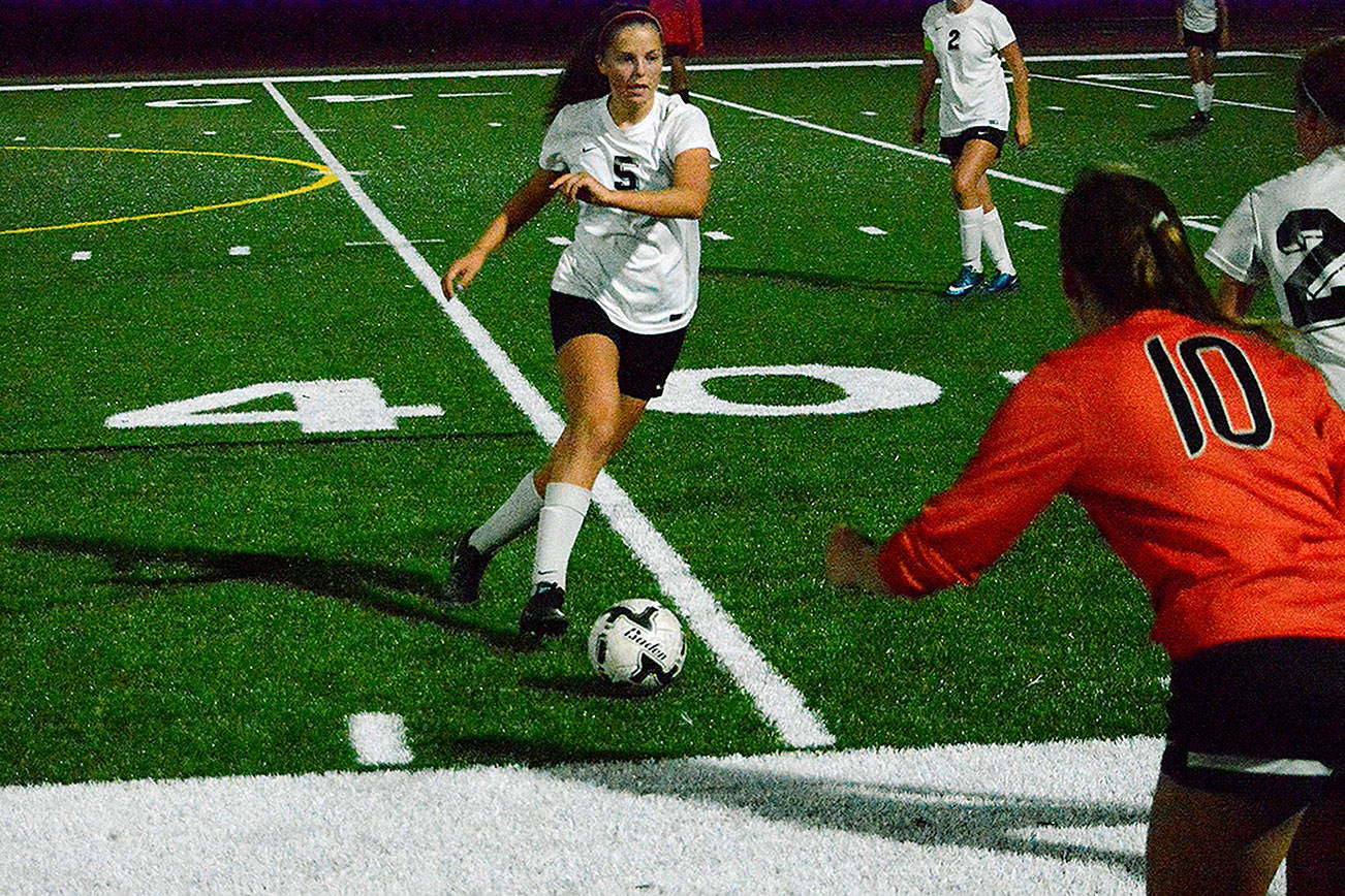 Klahowya’s Kate Streck (5) tries to turn up field against Central Kitsap during the Cougars’ 2-0 victory over Klahowya on Oct. 5. Mark Krulish/Kitsap News Group