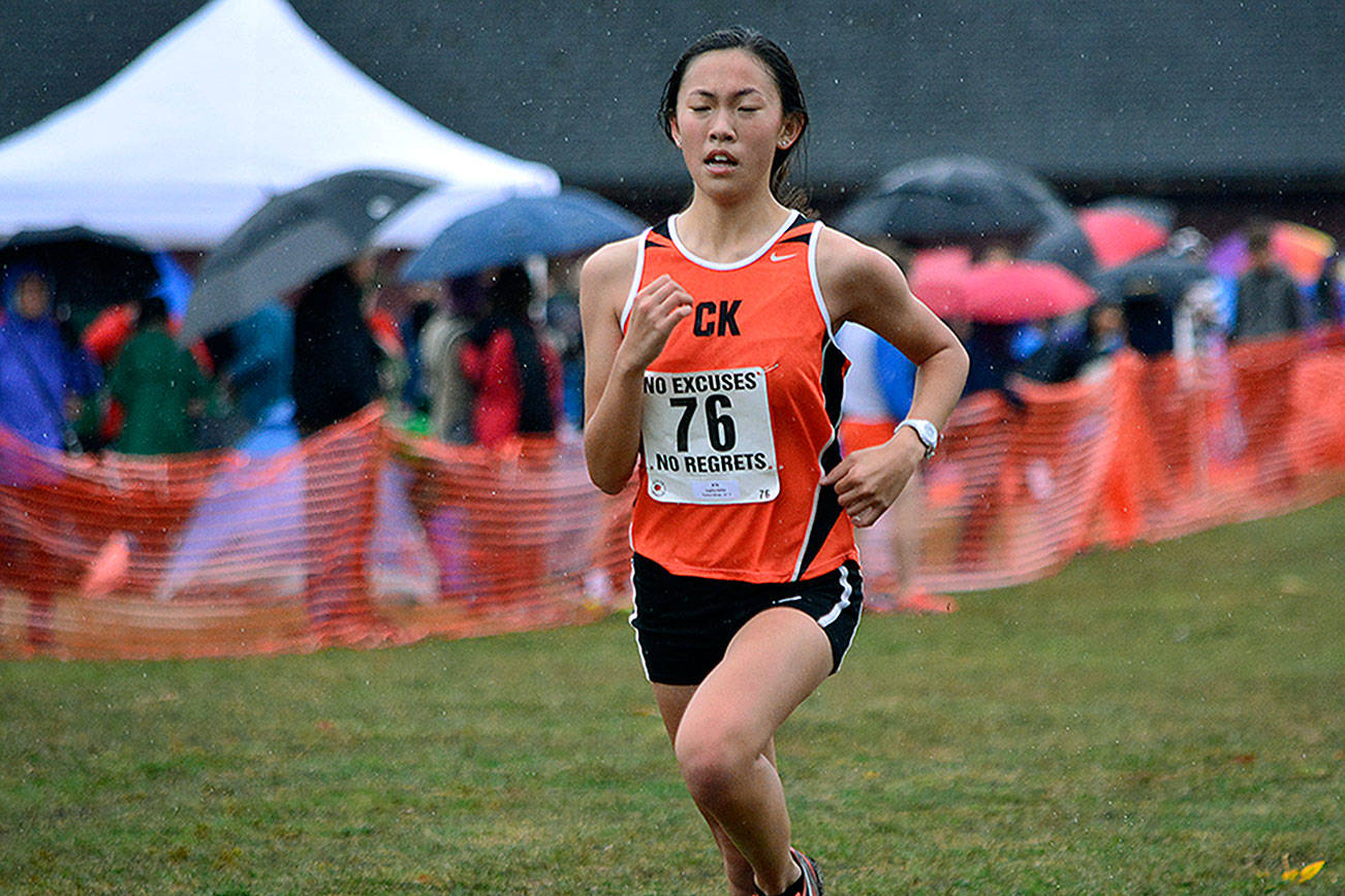 Central Kitsap’s Sophia Kohler pushes hard towards the finish line during the South Sound Conference championship meet on Oct. 19. (Mark Krulish/Kitsap News Group)