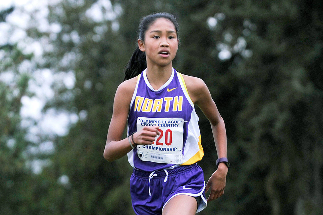 North Kitsap freshman Madison Zosa won the girls Olympic League championship cross country race with a time of 19:18.64 at The Cedars at Dungeness in Sequim on Oct. 19. (Michael Dashiell/Sequim Gazette)