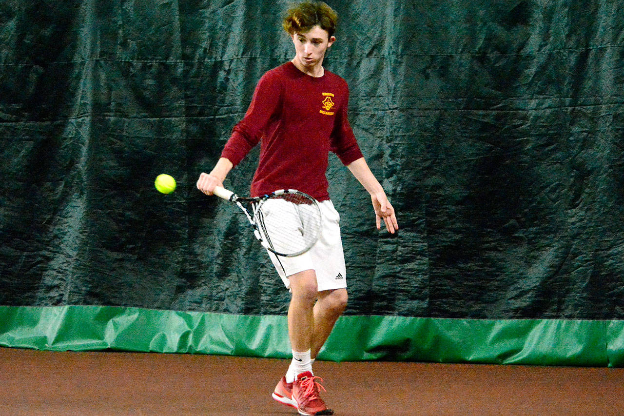 Kingston’s Ian Schmid placed fifth at the district singles tournament, which will allow him to advance to states. (Mark Krulish/Kitsap News Group)