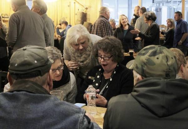 Mayor Becky Erickson and supporters at Western Red Brewing react to news that Erickson had won a third term by a landslide, Nov. 7. (Nick Twietmeyer/Kitsap News Group)