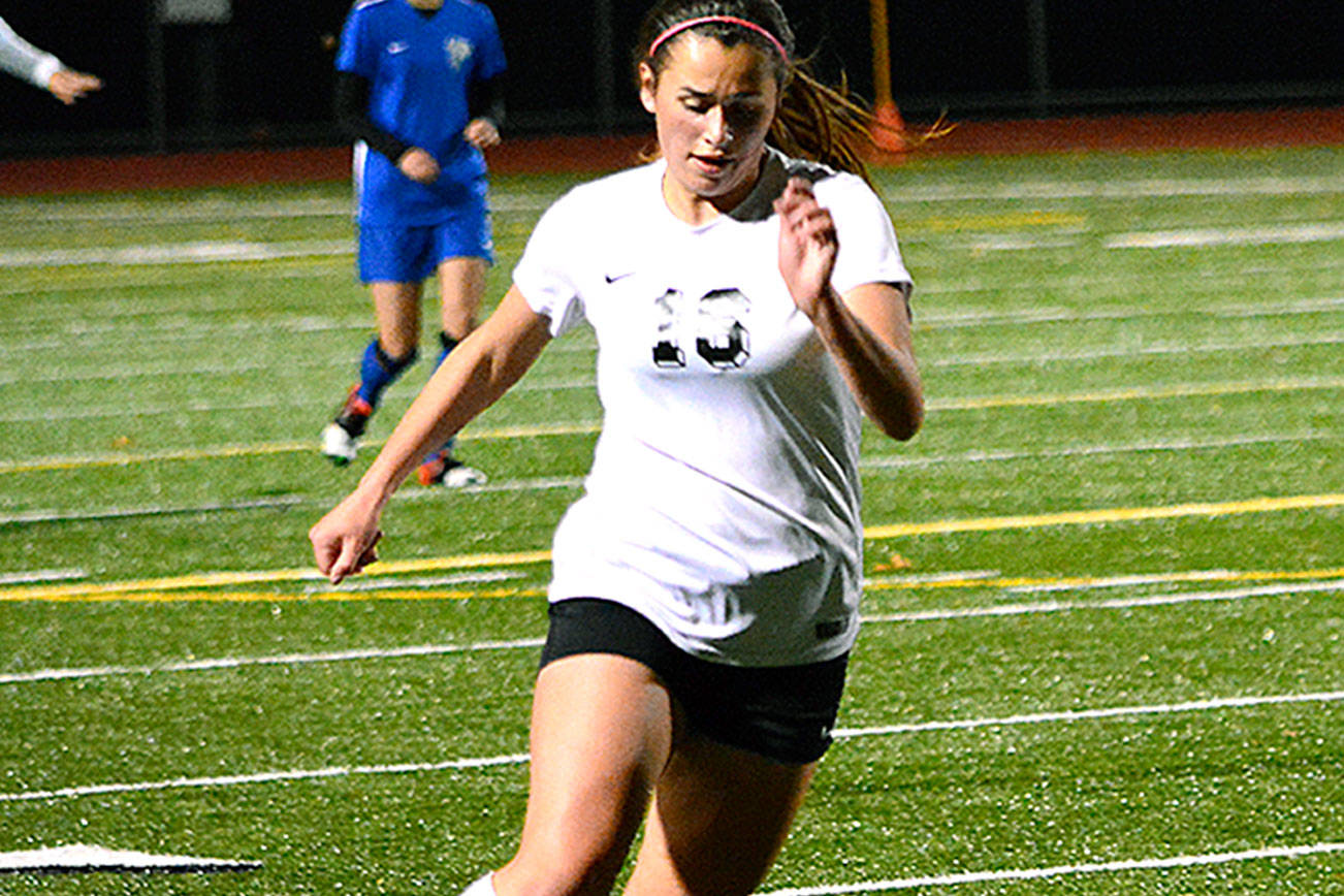 Klahowya’s Tyler Townsend leads the charge upfield against South Whidbey in the team’s first round state playoff game on Nov. 4. Klahowya won 4-1 to advance to the second round. (Mark Krulish/Kitsap News Group)