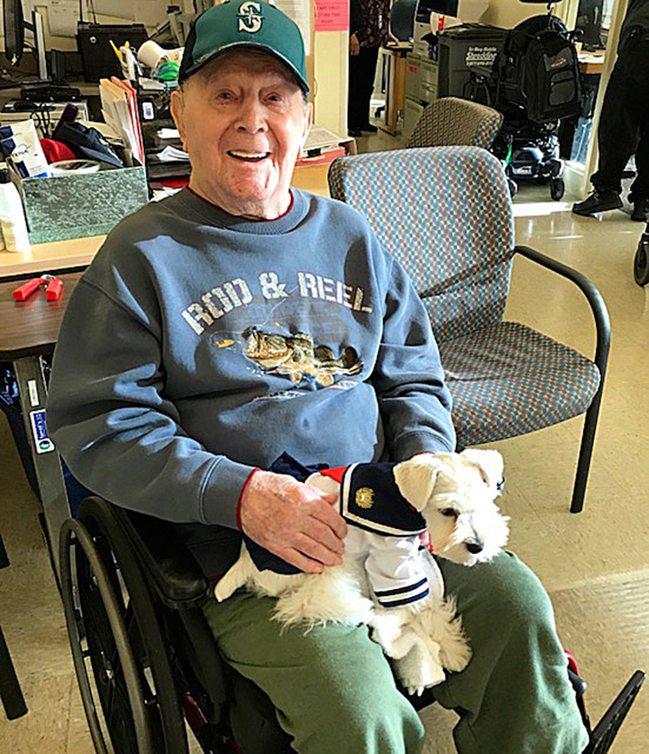 Dominick Mangini sits with Sailor in his lap for two hours every day.                                Courtesy photo