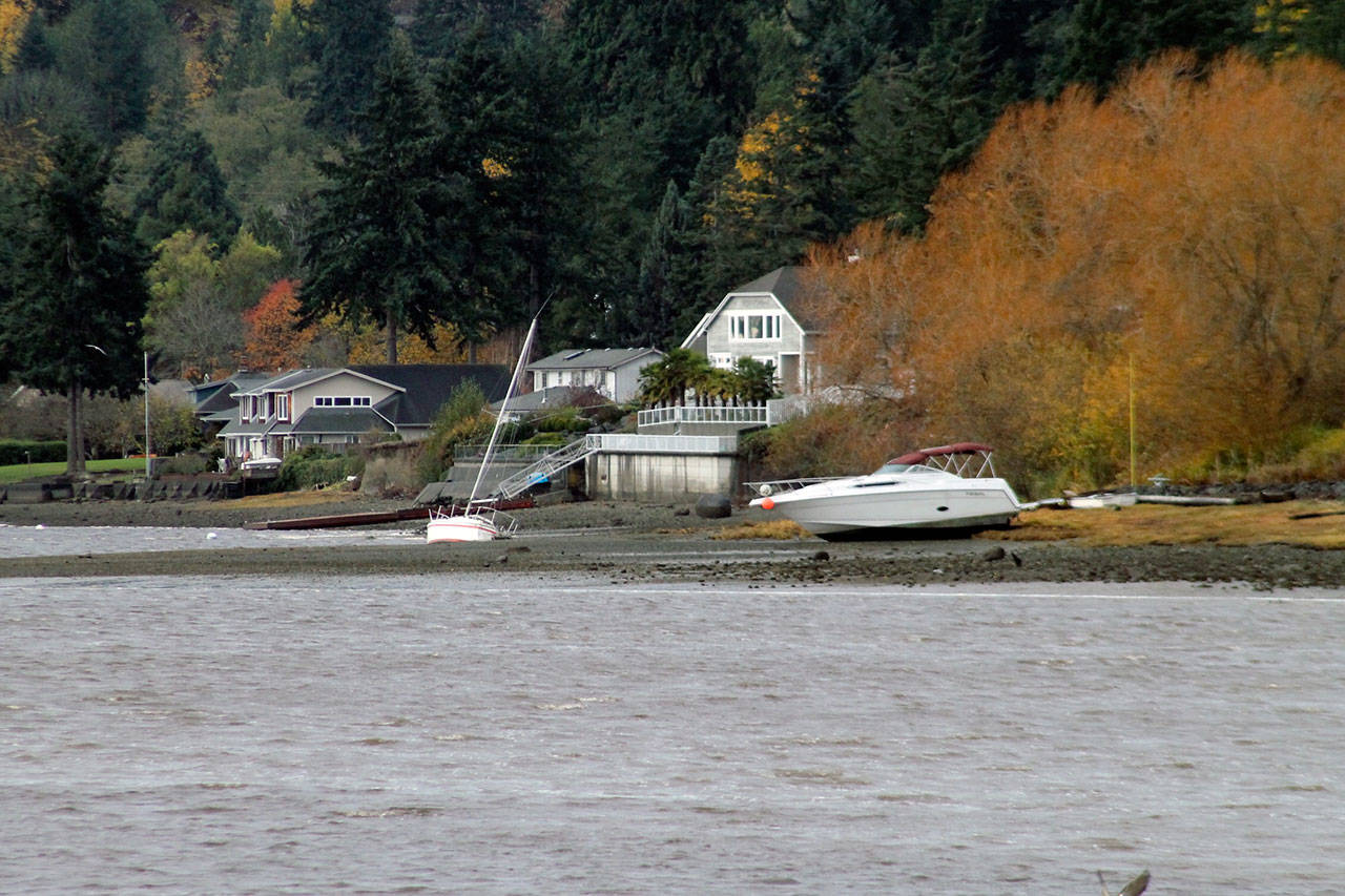 Two boats on the northwestern end of Liberty Bay were beached when heavy winds on Monday blew them free from their anchorage. Nick Twietmeyer | Kitsap News Group