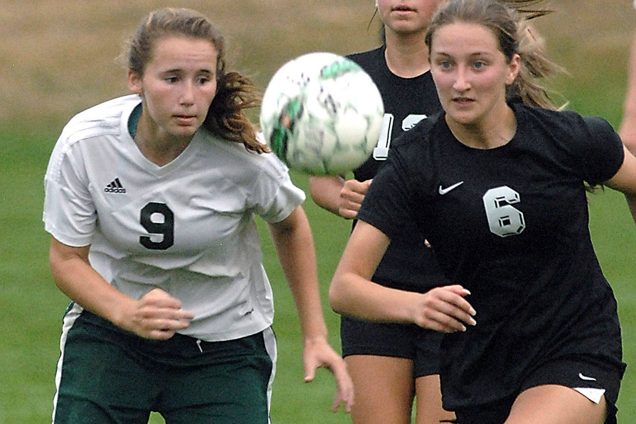 &lt;em&gt;Klahowya’s Gabrielle Mercoux and Rylee Radford chase down a loose ball during an early season game against Port Angeles. Radford was one of four Eagles players to be named to the All-League team. &lt;/em&gt;Keith Thorpe/Peninsula Daily News