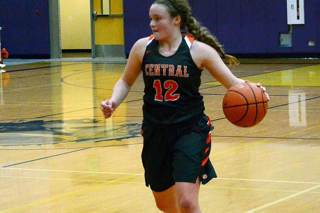 Central Kitsap’s Olivia Krog (12) sets up the offense against North Kitsap on Nov. 25.                                Mark Krulish/Kitsap News Group