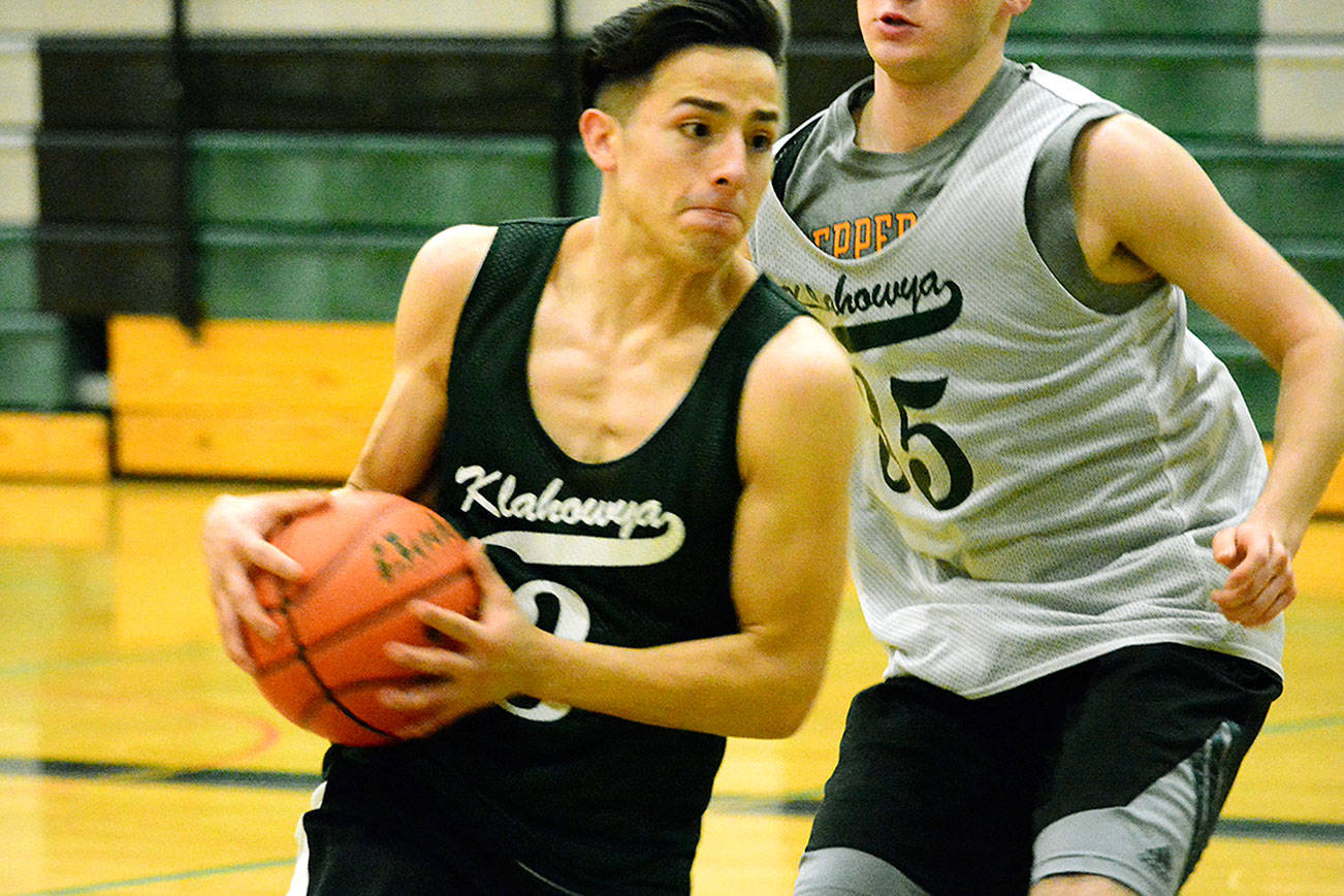 &lt;em&gt;Klahowya senior Tim Coots (3) drives into the paint during his team’s practice on Nov. 27.&lt;/em&gt;                                Mark Krulish/Kitsap News Group