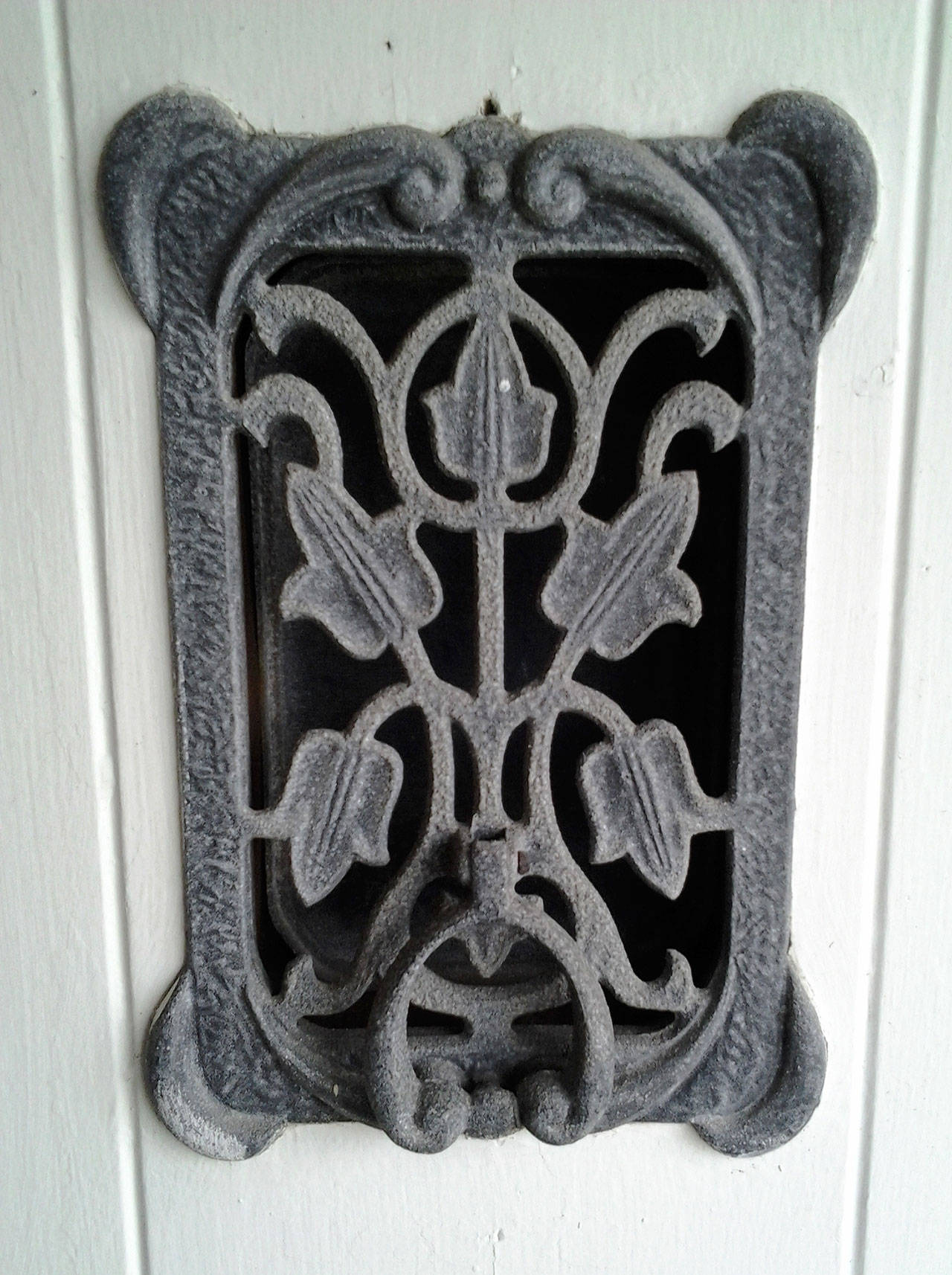 Some of the hardware at the Maggs House is original, such as this speakeasy door grill. (Richard Walker/Kitsap News Group)                                 Some of the hardware at the Maggs House is original, such as this speakeasy door grill. (Richard Walker/Kitsap News Group)