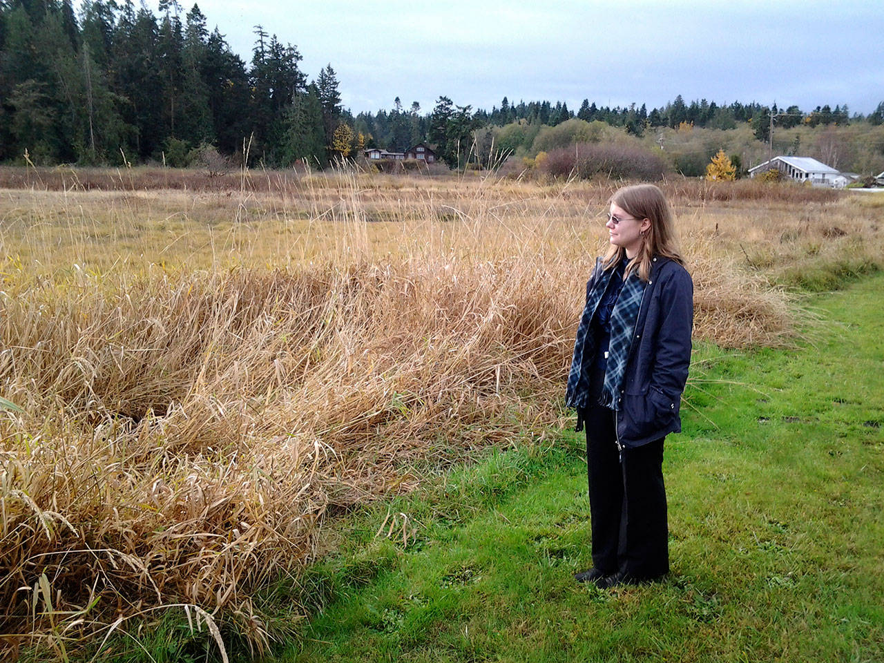 Maggs House manager Cassandra Rowland takes in the view of the wetland behind the Maggs House. “I love the view. It’s a gorgeous view and you can see all the life that comes out here,” Rowland said. (Richard Walker/Kitsap News Group)                                 Maggs House manager Cassandra Rowland takes in the view of the wetland behind the Maggs House. “I love the view. It’s a gorgeous view and you can see all the life that comes out here,” Rowland said. (Richard Walker/Kitsap News Group)