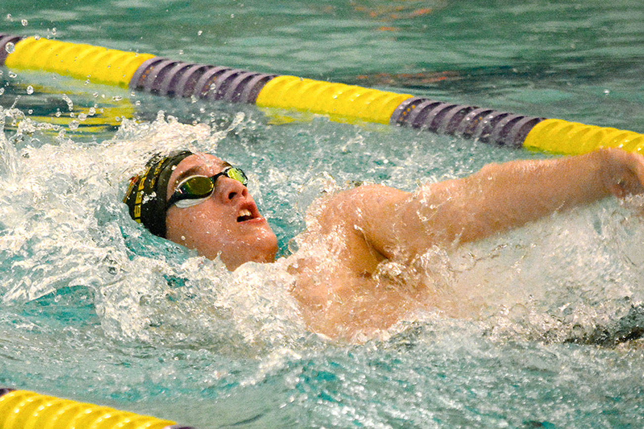 &lt;em&gt;Kingston junior Timothy Gallagher performs the backstroke during the 200 yard individual medley against North Kitsap. Gallagher finished with a time of 1:53.91, which qualified him for the state meet in that event. &lt;/em&gt;                                Mark Krulish/Kitsap News Group