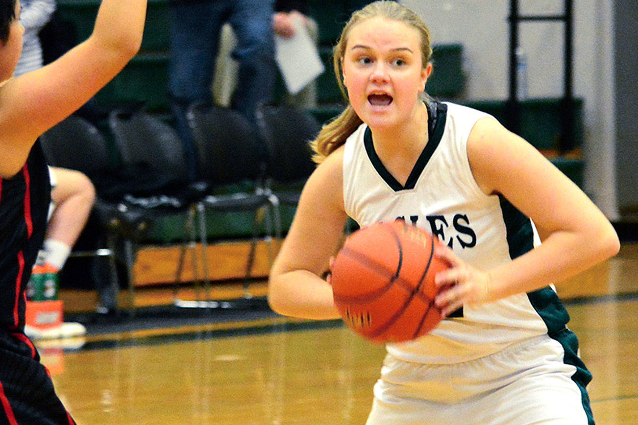 Klahowya senior Karli Eberhard calls out the play for her team during a 61-11 victory over Chief Kitsap Academy on Dec. 19. (Mark Krulish/Kitsap News Group)