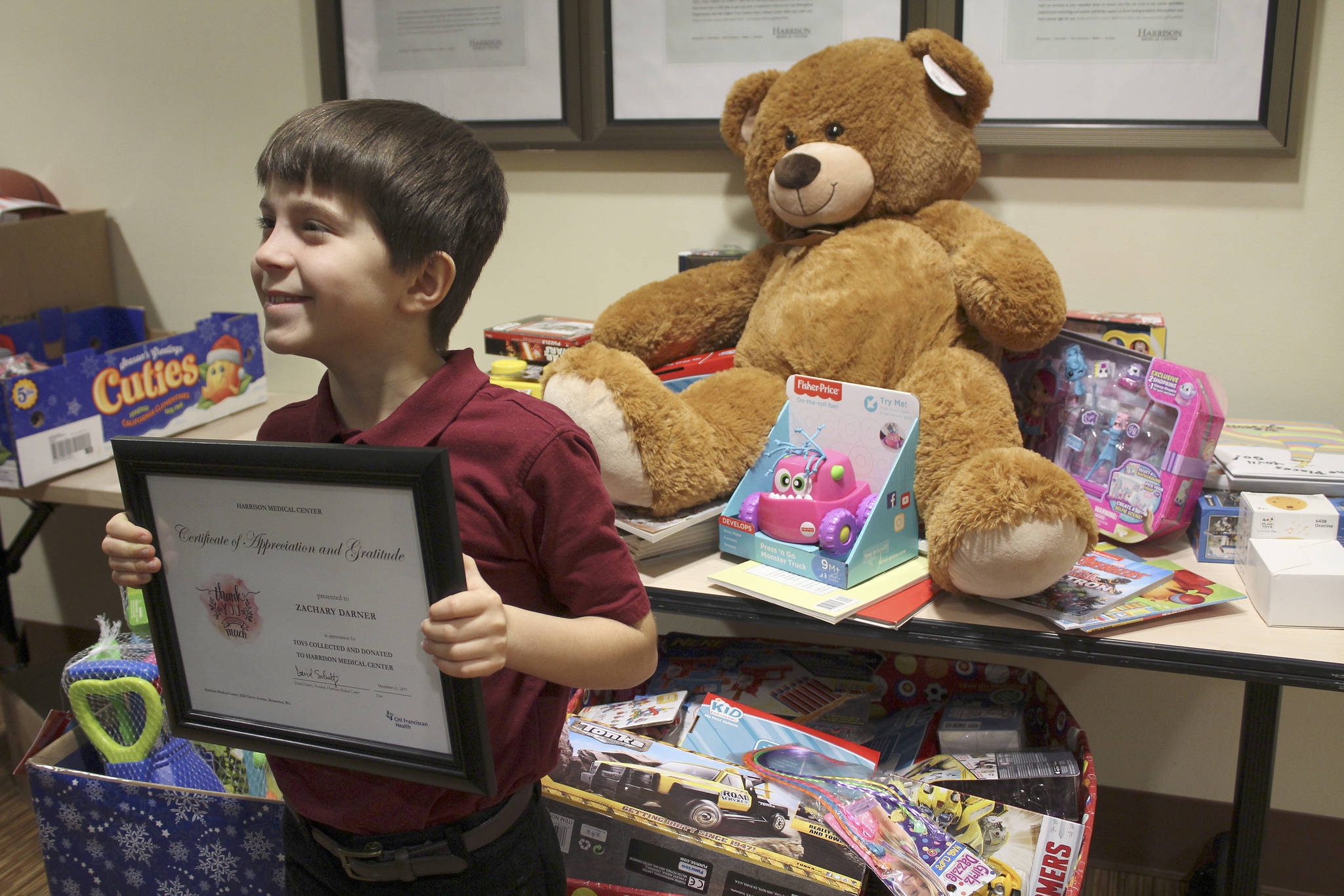 Zachary Darner founded Kidzz Helping Kidzz to collect donations of toys for gifting to children in three area hospitals. This year, the group collected and delivered more than 1,500 toys. (Courtesy photos)
