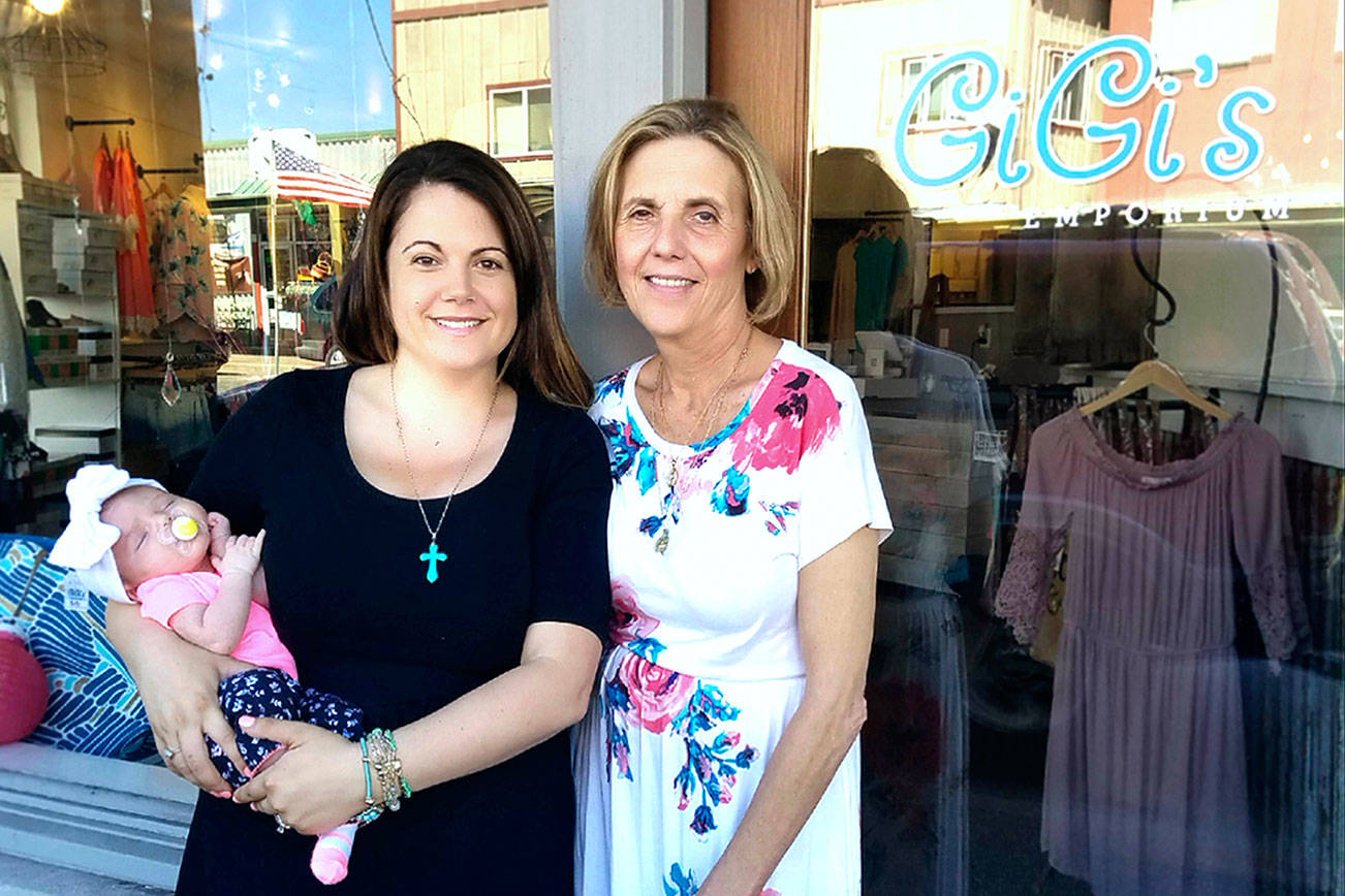 Danielle Gilchrist, left, with her daughter Aeva and mother Marie Carins in front of Gigi’s Emporium PNW. Together they own Gigi’s Emporium and manage both locations on opposite sides of the country.&lt;em&gt; (Courtesy photo)&lt;/em&gt;
