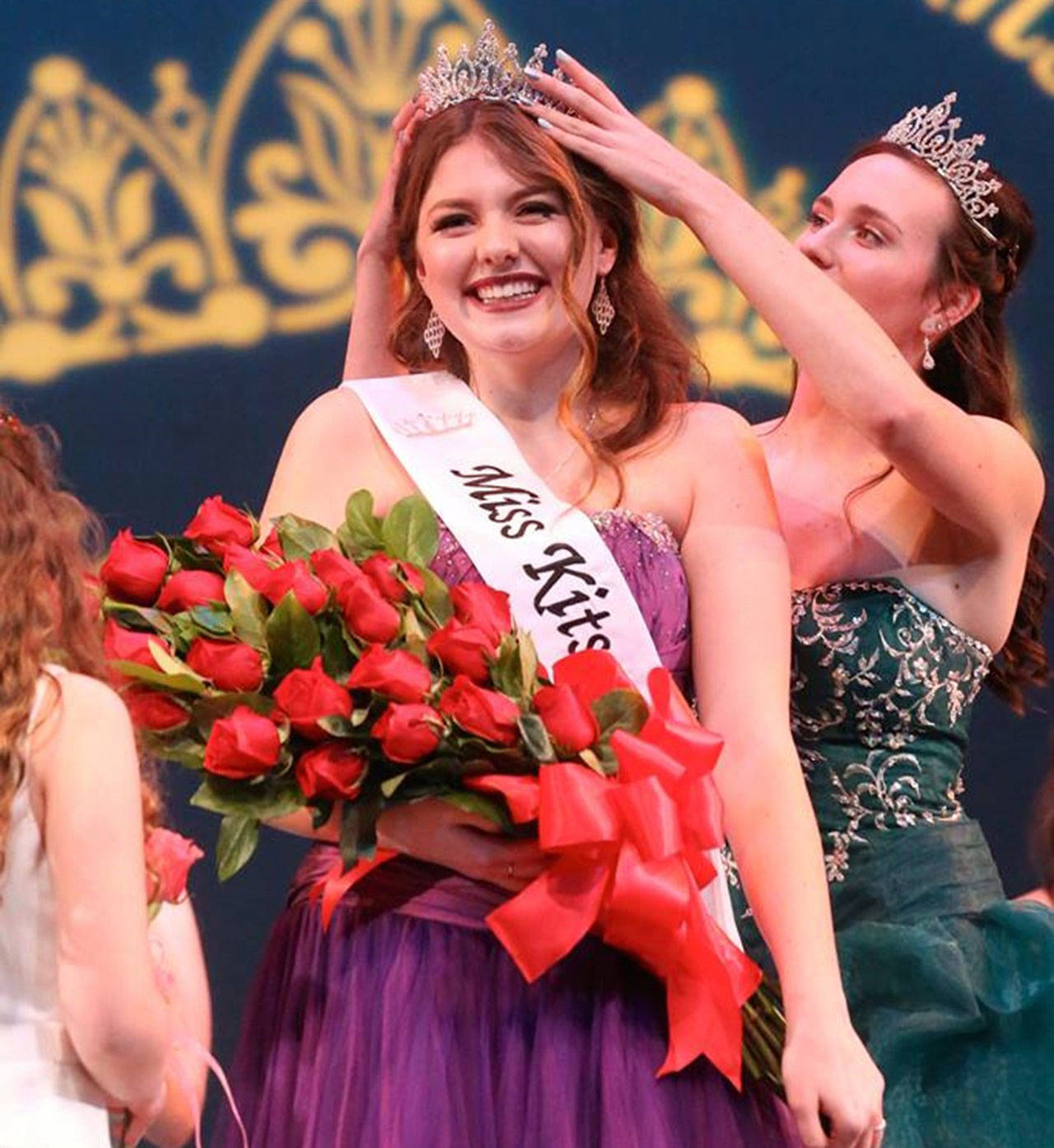 Miss Kitsap 2017 Mackenzie Zurbrugg passes her crown on to her successor, Alyssa Erickson.                                Jesse Beals/Olympic Photo Group