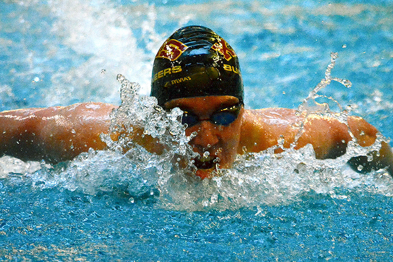 Ethan Fox, one of Kingston’s two swimmers with Ironmen status, competes in the 200 individual medley during a dual meet with Olympic. The Bucs won 106.5-69.5. (Mark Krulish/Kitsap News Group)