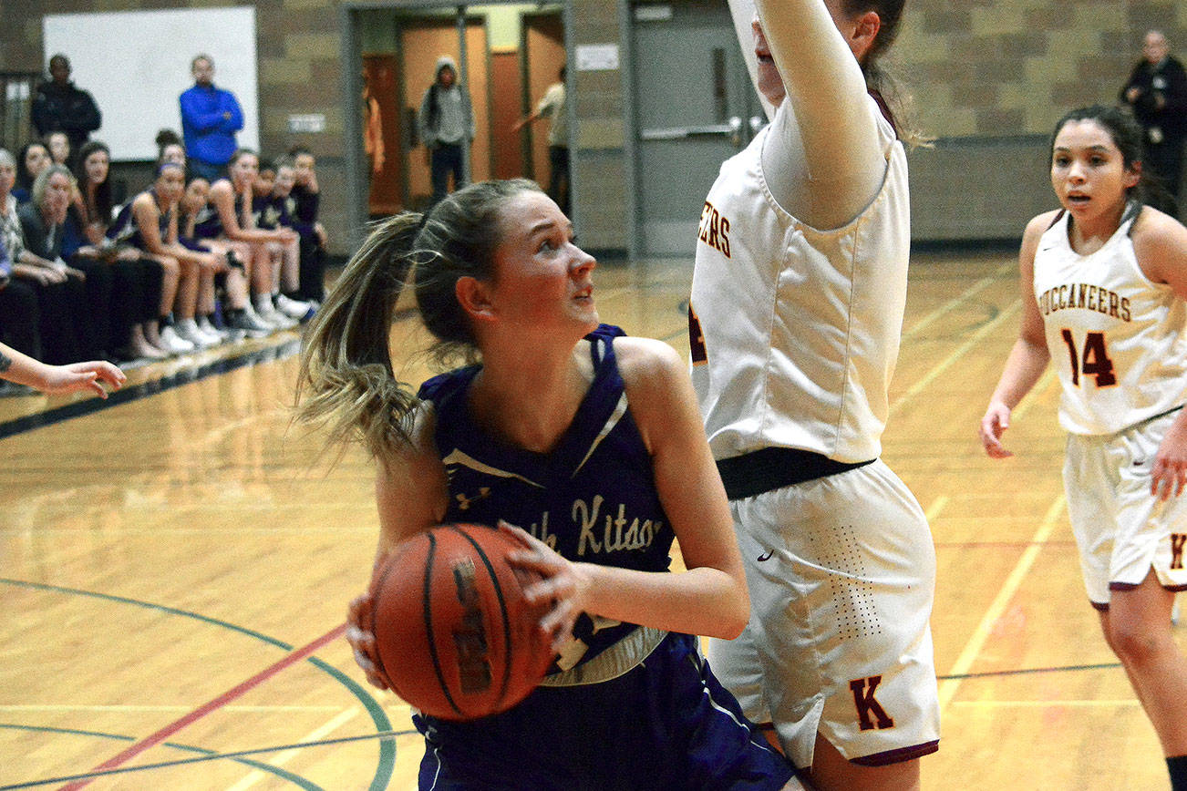 North Kitsap’s Grace Johnson looks for a way to the basket against Kingston. North Kitsap defeated its inter-district rival 67-60 on Jan. 19. (Mark Krulish/Kitsap News Group)