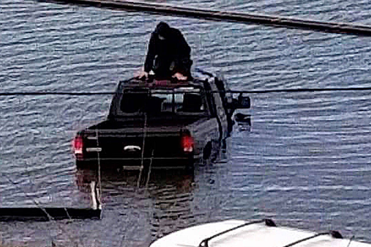 Truck gets unexpected carwash near ferry dock