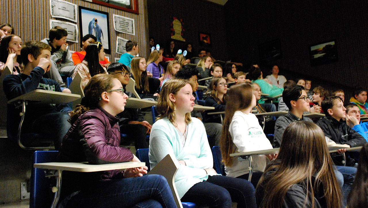 Seventh graders from Marcus Whitman watch as their fellow classmates take part in a mock City Council meeting. (Bob Smith | Kitsap Daily News)