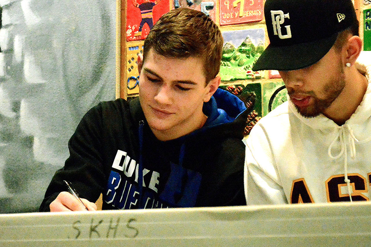 Mark Krulish | Kitsap News Group                                South Kitsap wrestler Mason Eaglin commits to Duke University.