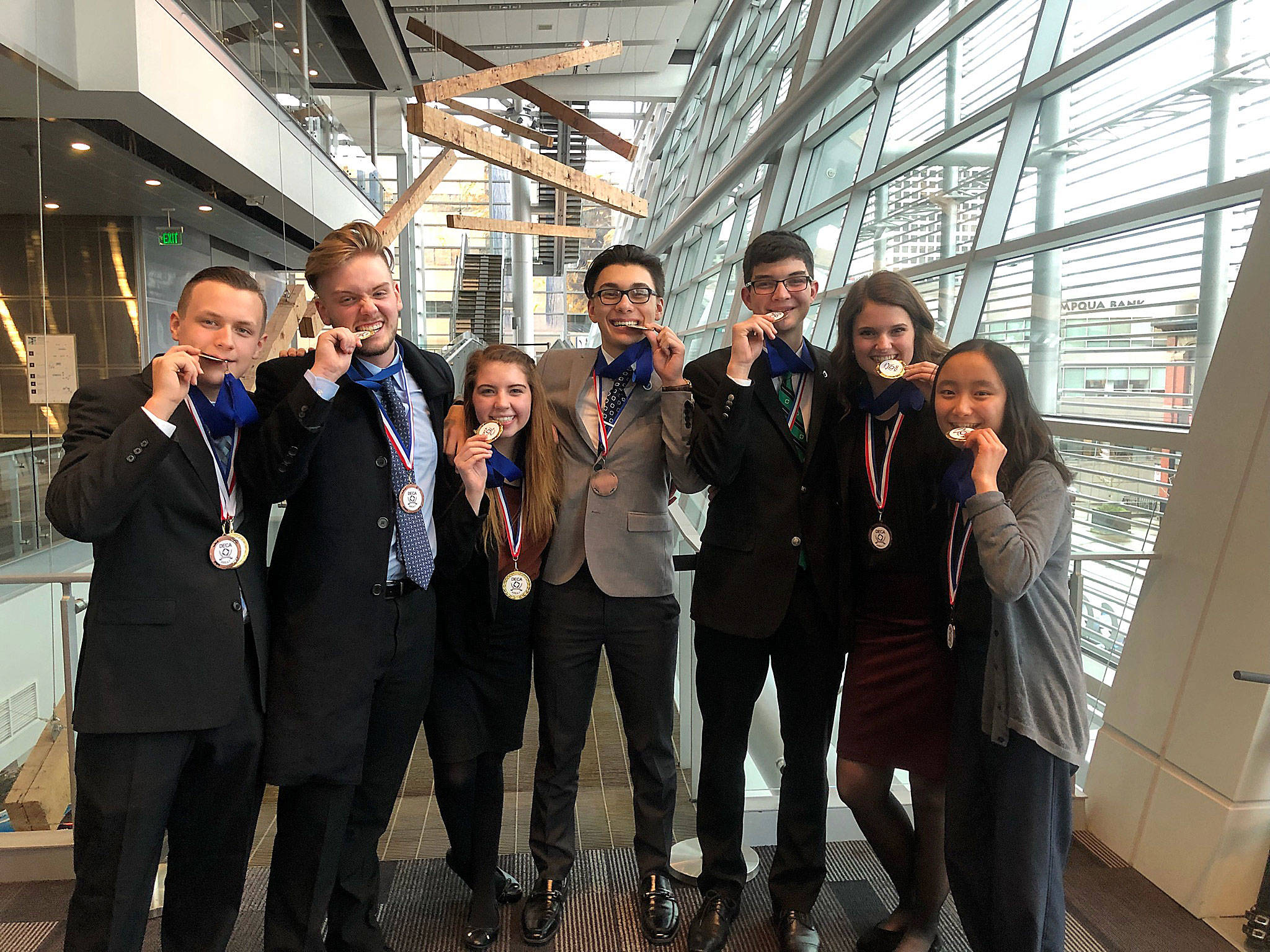 These students qualified for the state DECA competition. (Photo courtesy Betsi Feider)