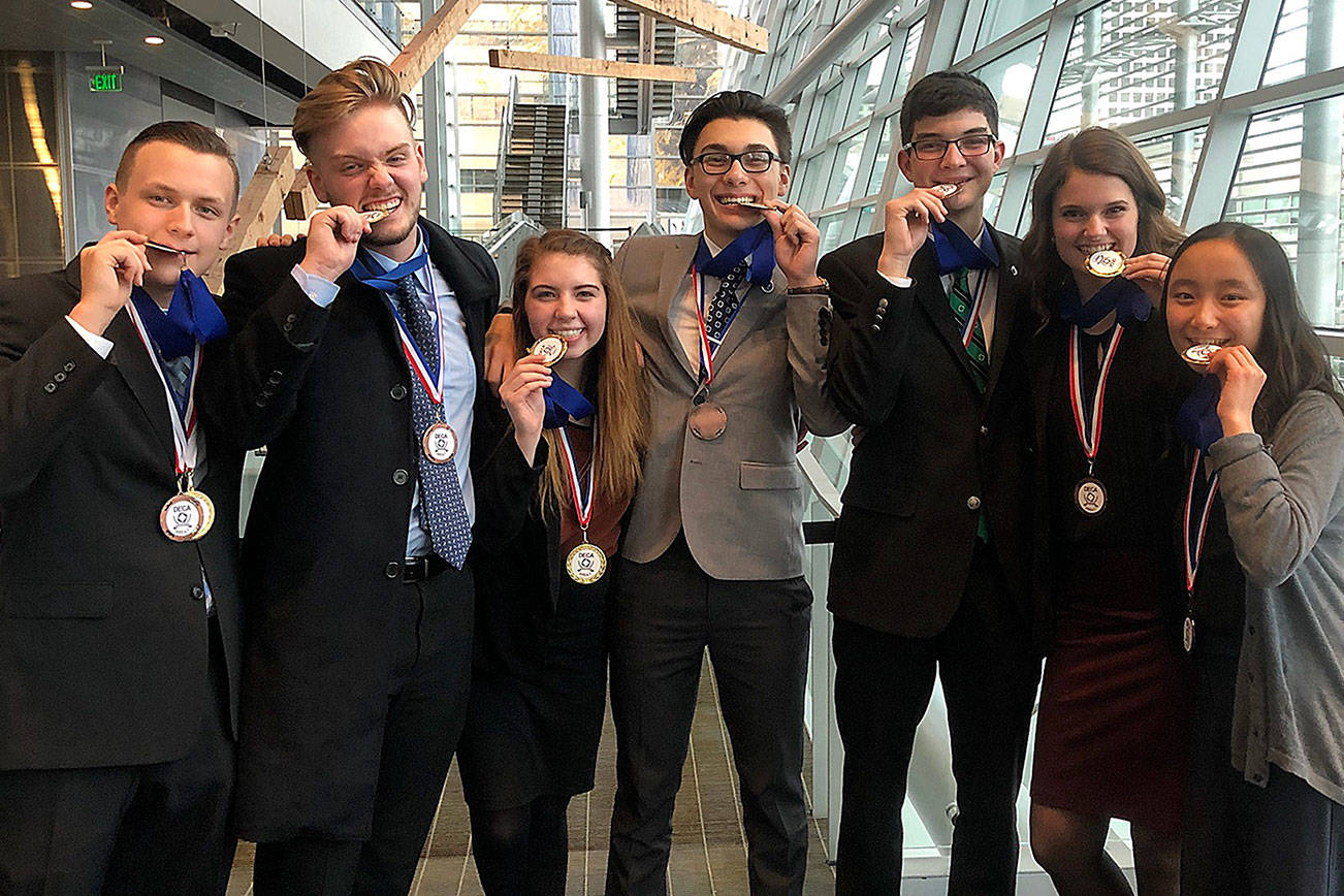 These students qualified for the state DECA competition. (Photo courtesy Betsi Feider)