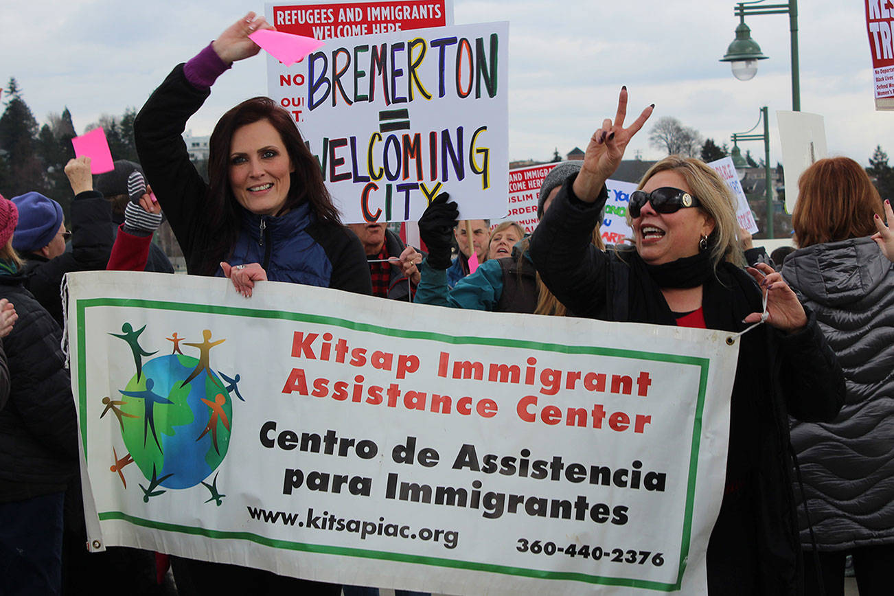 Kitsap Immigrant Assistance Center participated in the Kitsap Builds Bridges, Not Walls vigil in March 2017.                                Michelle Beahm | Kitsap News Group file photo