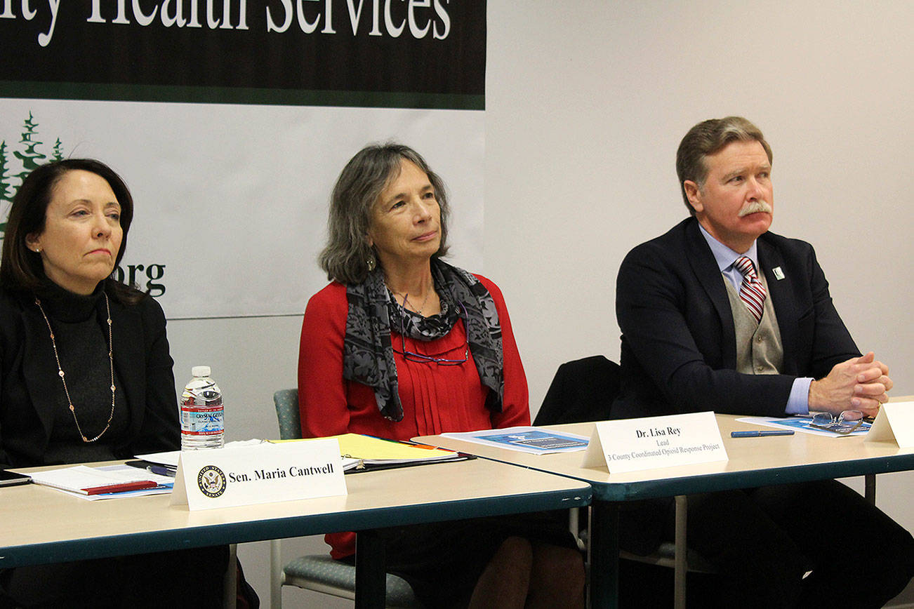 Sen. Maria Cantwell, D-Washington, at let, Dr. Lisa Rey and Bremerton Mayor Greg Wheeler listen at a meeting discussing Cantwell’s CARES Act.                                Michelle Beahm / Kitsap News Group