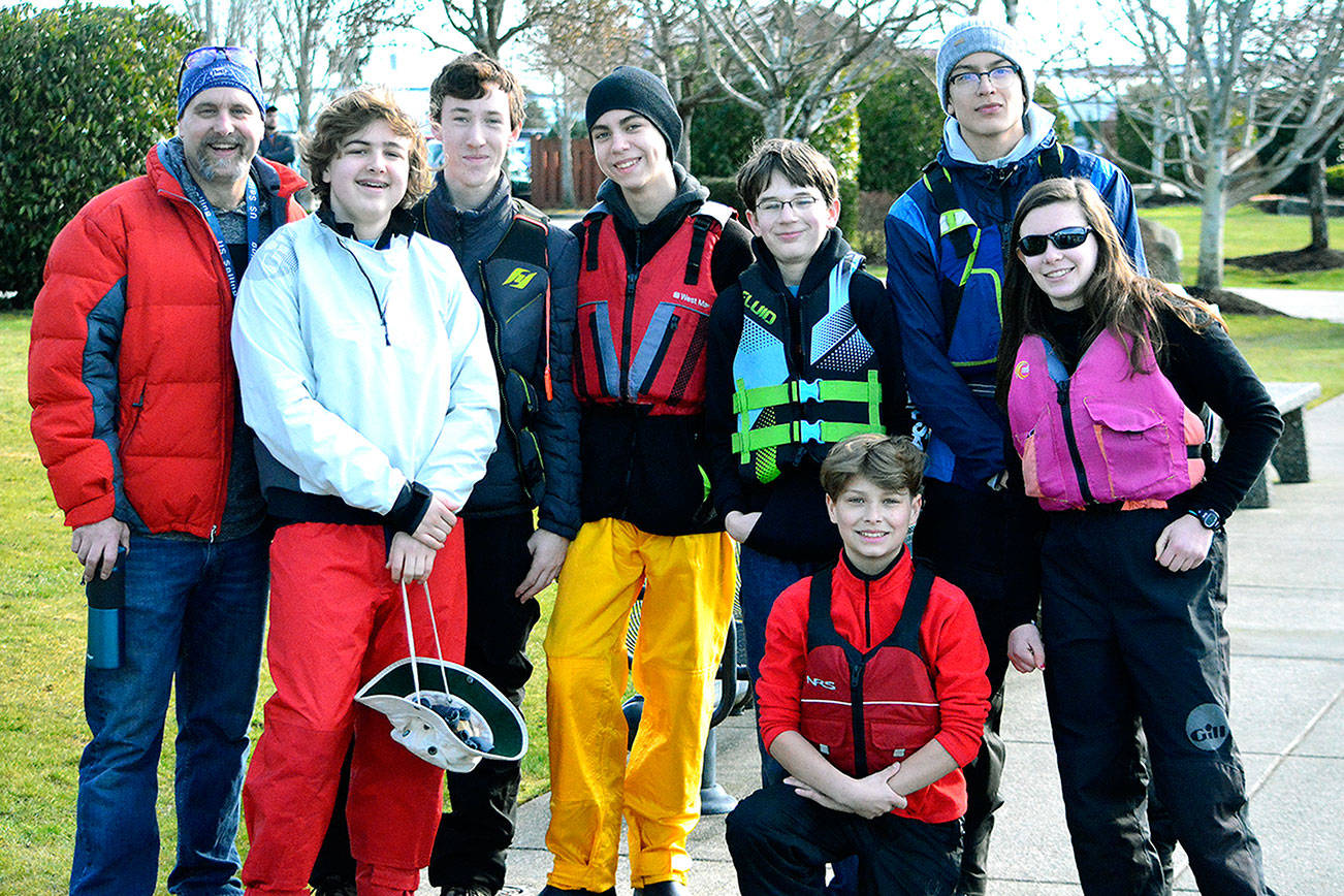 From left to right: Bruce Chandler, Morgan Chandler, Noah Pluska, Ian McConkey, Victor Taylor, Trenton Rodriguez, Santiago Portillo and Annelise Pardee. (Mark Krulish/Kitsap News Group)