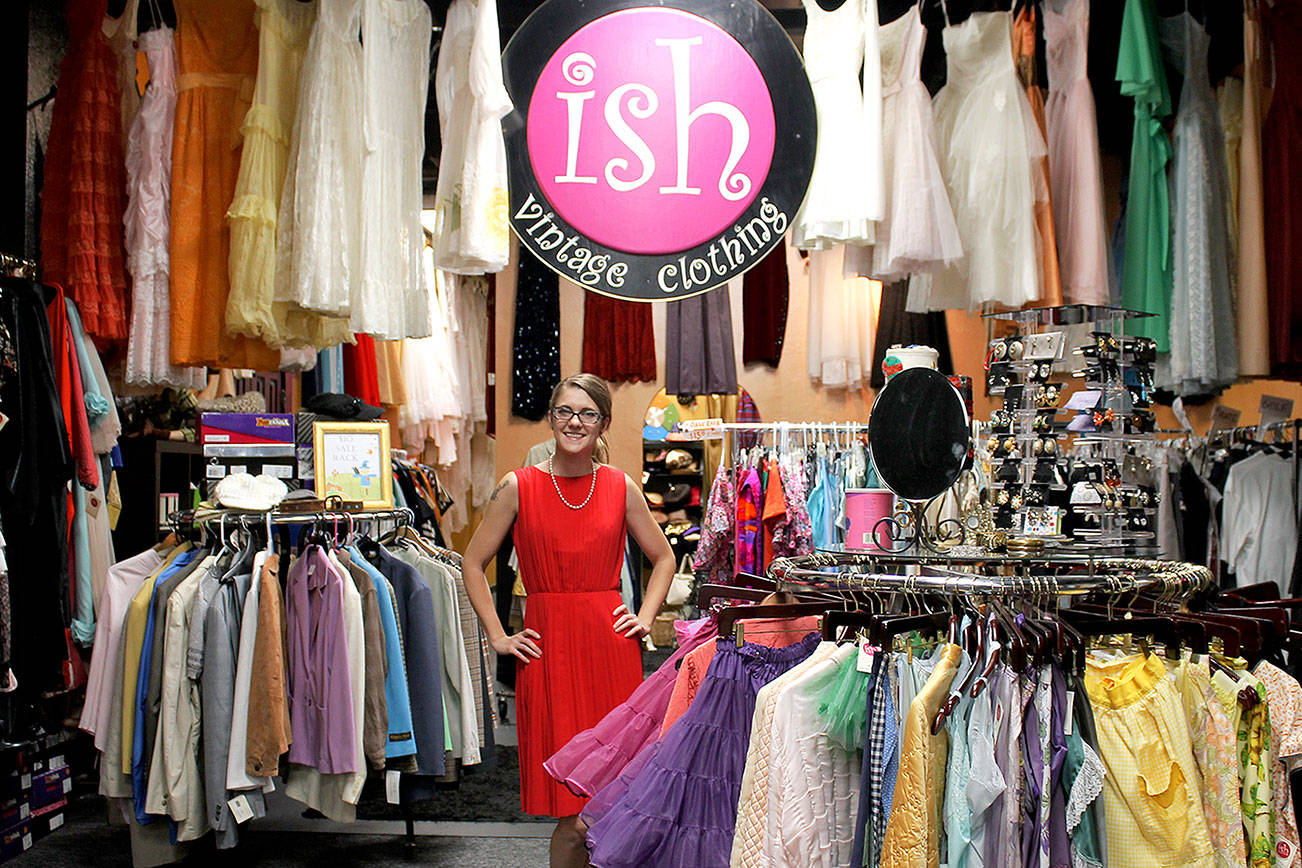 Holly Duncan helps promotes Small Business Saturday at ISH Vintage Costumes and Clothing, located at 249 4th St., Bremerton. ISH has been put on the market by owner Collette Jones.                                (Michelle Beahm | Kitsap News Group file photo)