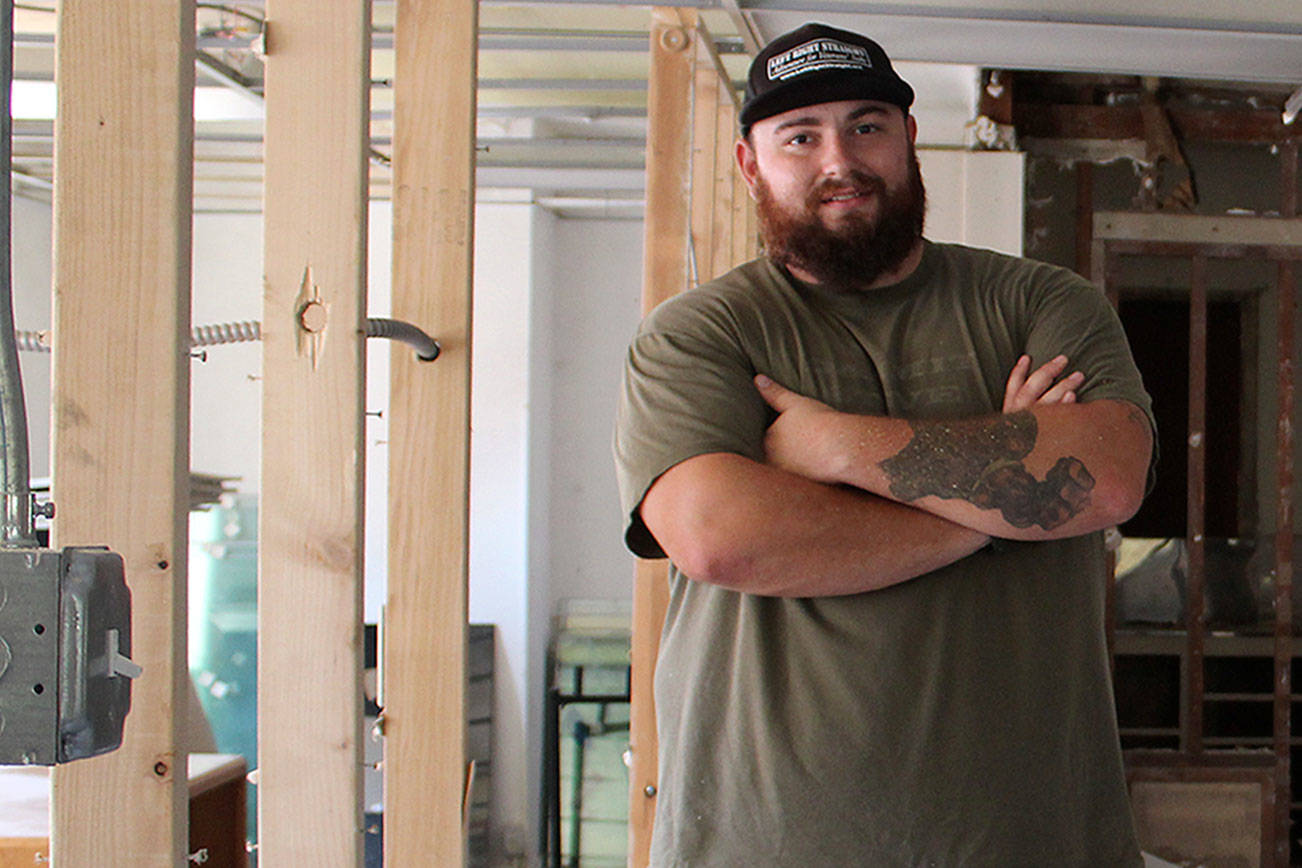 Sean Delaire, founder and executive director of Left Right Straight, stands in the building that will soon be the new headquarters for the nonprofit organization, in the early days of renovation.                                Michelle Beahm | Kitsap News Group file photo