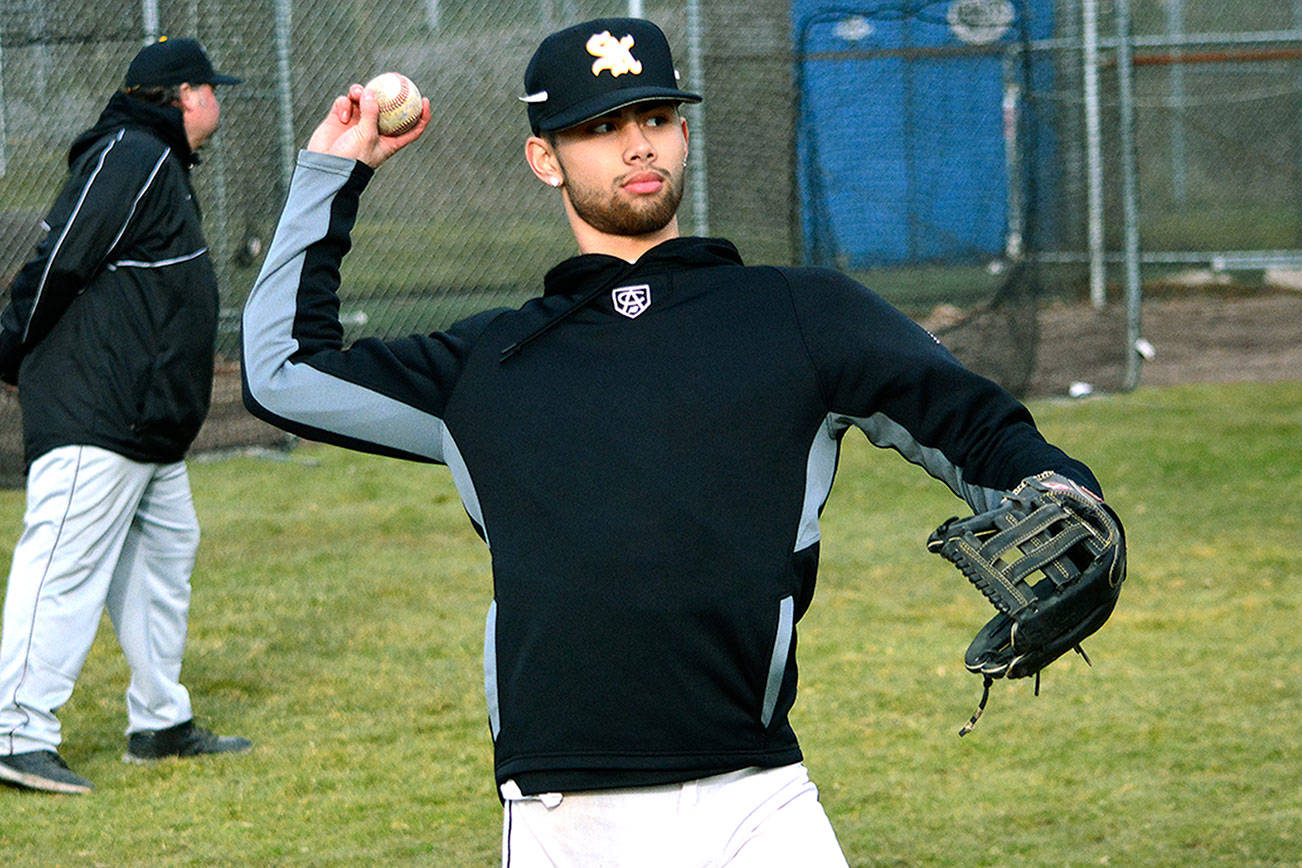 Dusty Garcia warms up during spring practice for South Kitsap. He will attend Arizona State next year to play college baseball.                                Mark Krulish | Kitsap News Group