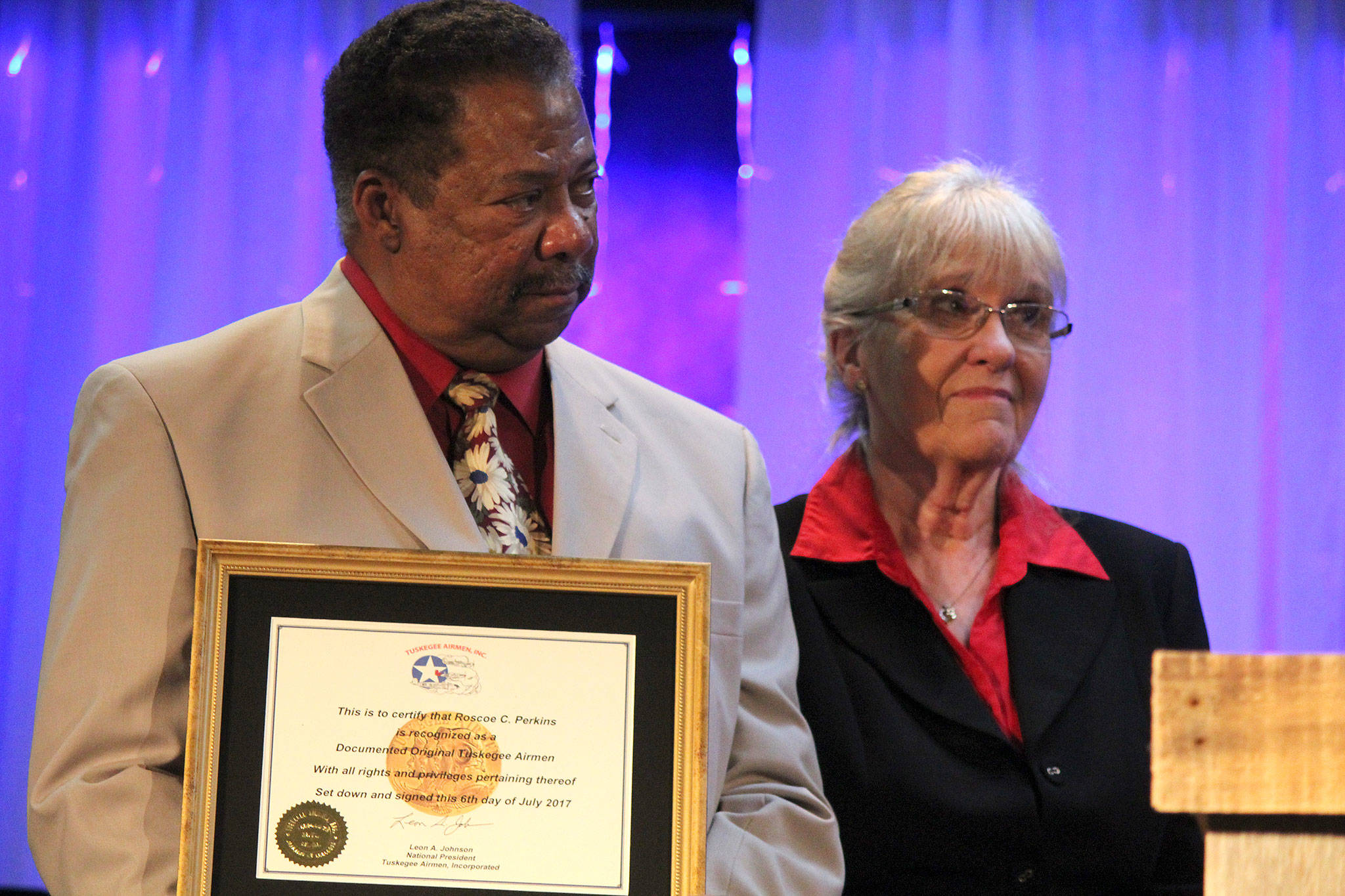 &lt;em&gt;Robert and Carolynn Perkins accept a replica of the Congressional Gold Medal on behalf of Robert’s father, Roscoe Perkins.&lt;/em&gt;                                Michelle Beahm/Kitsap News Group
