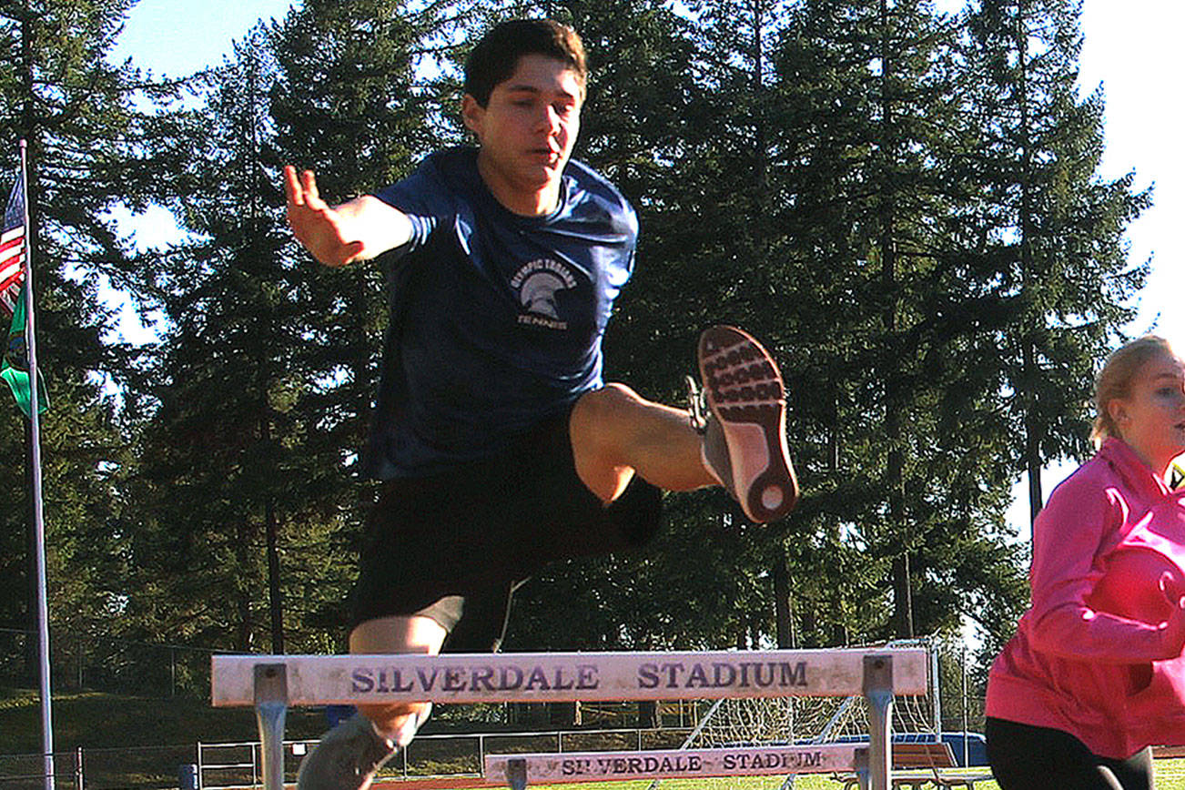 Zachary Wyant, shown here practicing hurdles during a spring practice, took 12th in the 300-meter hurdles event at the Cardinal Relays in Orting. (Jacob Moore/Kitsap News Group)