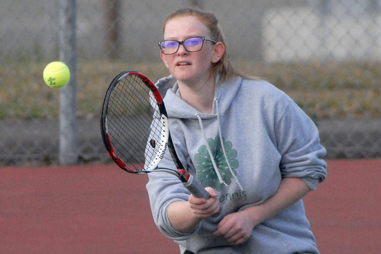 Klahowya’s Maddy Rienks competes in her single’s match against Port Angeles’ Summer Olsen on Tuesday at Port Angeles High School. (Keith Thorpe/Peninsula Daily News)